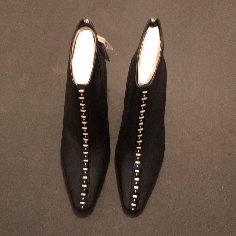 Leather boots with metal detail worn once